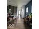 Open concept floor plan, kitchen view with island, modern cabinets and decor at 1001 Harlan St, Indianapolis, IN 46203