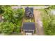 Stunning aerial view of the backyard with a matching garage, all securely enclosed within a new wooden fence at 1027 Hosbrook St, Indianapolis, IN 46203