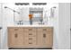 Bathroom featuring a double sink vanity, quartz countertop, and contemporary fixtures at 1027 Hosbrook St, Indianapolis, IN 46203