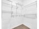 Walk-in closet features white wire shelving for organized storage solutions at 1027 Hosbrook St, Indianapolis, IN 46203