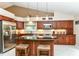 Well-appointed kitchen with stainless steel appliances, granite countertops, and custom cabinetry at 10759 Sawgrass Dr, Fishers, IN 46037