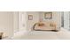 Large bedroom featuring a view into the hallway and bathroom at 11510 Monon Farms Ln, Carmel, IN 46032