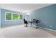 Bright bedroom with large windows and a neutral carpet, ready for your personal touch at 11510 Monon Farms Ln, Carmel, IN 46032