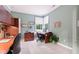 Bright home office features built-in shelving and a large window for natural light at 11510 Monon Farms Ln, Carmel, IN 46032