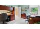 Spacious office area with built-in desk and storage cabinets for an organized workspace at 11510 Monon Farms Ln, Carmel, IN 46032