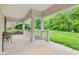 Spacious porch featuring white pillars and railings, perfect for outdoor entertaining at 11510 Monon Farms Ln, Carmel, IN 46032