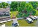 Stunning waterfront home featuring lush landscaping and private boat docks at 1240 Stringtown Pike, Cicero, IN 46034