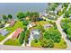 Stunning aerial view of lakefront property with pool, lush landscaping and ample parking at 1240 Stringtown Pike, Cicero, IN 46034