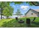 Beautiful backyard with a view of the lake, a charming fire pit, and comfortable seating for relaxation at 1240 Stringtown Pike, Cicero, IN 46034