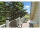 Inviting balcony with comfortable seating and a view of mature trees at 1240 Stringtown Pike, Cicero, IN 46034