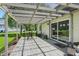 Relaxing covered patio with outdoor seating, perfect for enjoying the outdoors and a peek of the backyard at 1240 Stringtown Pike, Cicero, IN 46034