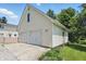Detached two-car garage with a well-maintained exterior at 1240 Stringtown Pike, Cicero, IN 46034