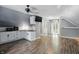 Open floor plan features an eat-in kitchen with modern appliances and a sliding glass door to a private patio at 1240 Stringtown Pike, Cicero, IN 46034