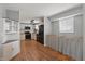Bright kitchen featuring white cabinets, wood countertops, stainless steel appliances, and wood flooring at 1240 Stringtown Pike, Cicero, IN 46034