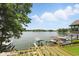 Stunning lake view with boat docks, ample space for lounging, and a new construction dock being erected at 1240 Stringtown Pike, Cicero, IN 46034