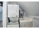 Convenient laundry area features a stacked washer and dryer with additional storage at 1240 Stringtown Pike, Cicero, IN 46034