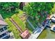 Unique waterfront property with stairs to a dock and outdoor seating areas at 1240 Stringtown Pike, Cicero, IN 46034