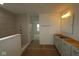 A bright bathroom features a shower and vanity, offering a functional and unfinished space at 12403 Fresh Stock Dr, Noblesville, IN 46060