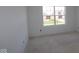 Bedroom featuring a large, bright window and blank canvas for customization and decor at 12403 Fresh Stock Dr, Noblesville, IN 46060