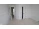 An unfinished bedroom features two doorways, leading to other parts of the home at 12403 Fresh Stock Dr, Noblesville, IN 46060