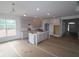 Unfinished kitchen featuring a large island, recessed lighting, and ample cabinet space at 12403 Fresh Stock Dr, Noblesville, IN 46060