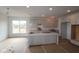 Unfinished kitchen featuring a large island, recessed lighting, and ample cabinet space at 12403 Fresh Stock Dr, Noblesville, IN 46060