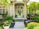 Inviting front porch with decorative columns and a charming entry, enhancing the home's welcoming ambiance at 13069 Abraham Run, Carmel, IN 46033