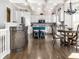 Open kitchen featuring a large island, modern cabinetry, and hardwood floors perfect for dining and entertaining at 13069 Abraham Run, Carmel, IN 46033