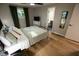 Comfortable bedroom with hardwood floors, closet, and access to bathroom at 1309 Rolling Ct, Westfield, IN 46074