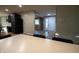 Bright dining room with hardwood floors, neutral walls, a modern chandelier, and ample seating for six at 1309 Rolling Ct, Westfield, IN 46074