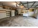 Spacious garage with built-in shelves, laundry area, and ample storage at 1309 Rolling Ct, Westfield, IN 46074