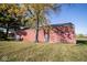 Large barn featuring red siding and multiple access doors at 13518 (3 Lots) Promise Rd, Fishers, IN 46038