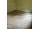 A standard carpeted bedroom features neutral walls and adequate space at 13518 (3 Lots) Promise Rd, Fishers, IN 46038