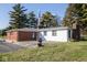 Home showcasing a well-kept lawn, brick chimney, and partially brick siding at 13518 (3 Lots) Promise Rd, Fishers, IN 46038