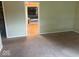 Living room with carpet and a view of the billiard room and fireplace at 13518 (3 Lots) Promise Rd, Fishers, IN 46038