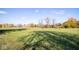 Wide-open yard providing space for recreation, set against a backdrop of clear blue skies at 13518 (3 Lots) Promise Rd, Fishers, IN 46038