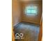 Small bedroom featuring light peach walls, window with natural light and blue carpeting at 13518 Promise Rd, Fishers, IN 46038