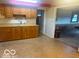Traditional kitchen features wood cabinets and tile backsplash at 13518 Promise Rd, Fishers, IN 46038