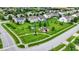 Aerial view of a neighborhood green space featuring a playground and gazebo at 1384 Horse Shoe, Greenwood, IN 46143