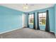 Bedroom with bright walls, neutral carpet, with two windows showing the neighborhood at 1384 Horse Shoe, Greenwood, IN 46143