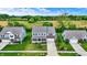 Two-story home with a brick facade, a front yard, a two-car garage and landscaping at 1384 Horse Shoe, Greenwood, IN 46143