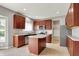 Modern kitchen featuring stainless steel appliances, a functional center island, and ample cabinet space for storage at 1384 Horse Shoe, Greenwood, IN 46143