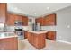 Beautiful kitchen with stainless steel appliances and center island, perfect for cooking and entertaining guests at 1384 Horse Shoe, Greenwood, IN 46143