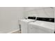 Bright laundry room with sink and shelving at 1384 Horse Shoe, Greenwood, IN 46143