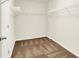 The walk-in closet offers metal racks for organized storage at 1384 Horse Shoe, Greenwood, IN 46143