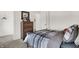 Serene bedroom boasts a carpeted floor, sports decor, and a view to an open closet at 15344 Cardonia Rd, Fishers, IN 46037