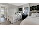 Charming bedroom featuring two twin beds, stylish artwork, and natural light for a comfortable space at 15360 Cardonia Rd, Fishers, IN 46037