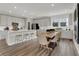 Inviting dining space adjacent to the kitchen featuring a wooden table and seating, perfect for gatherings at 15360 Cardonia Rd, Fishers, IN 46037