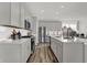 Modern kitchen showcasing stainless steel appliances, white countertops, and ample storage space at 15360 Cardonia Rd, Fishers, IN 46037