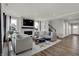 Inviting living room featuring a fireplace and seamless connection to the kitchen area at 15360 Cardonia Rd, Fishers, IN 46037